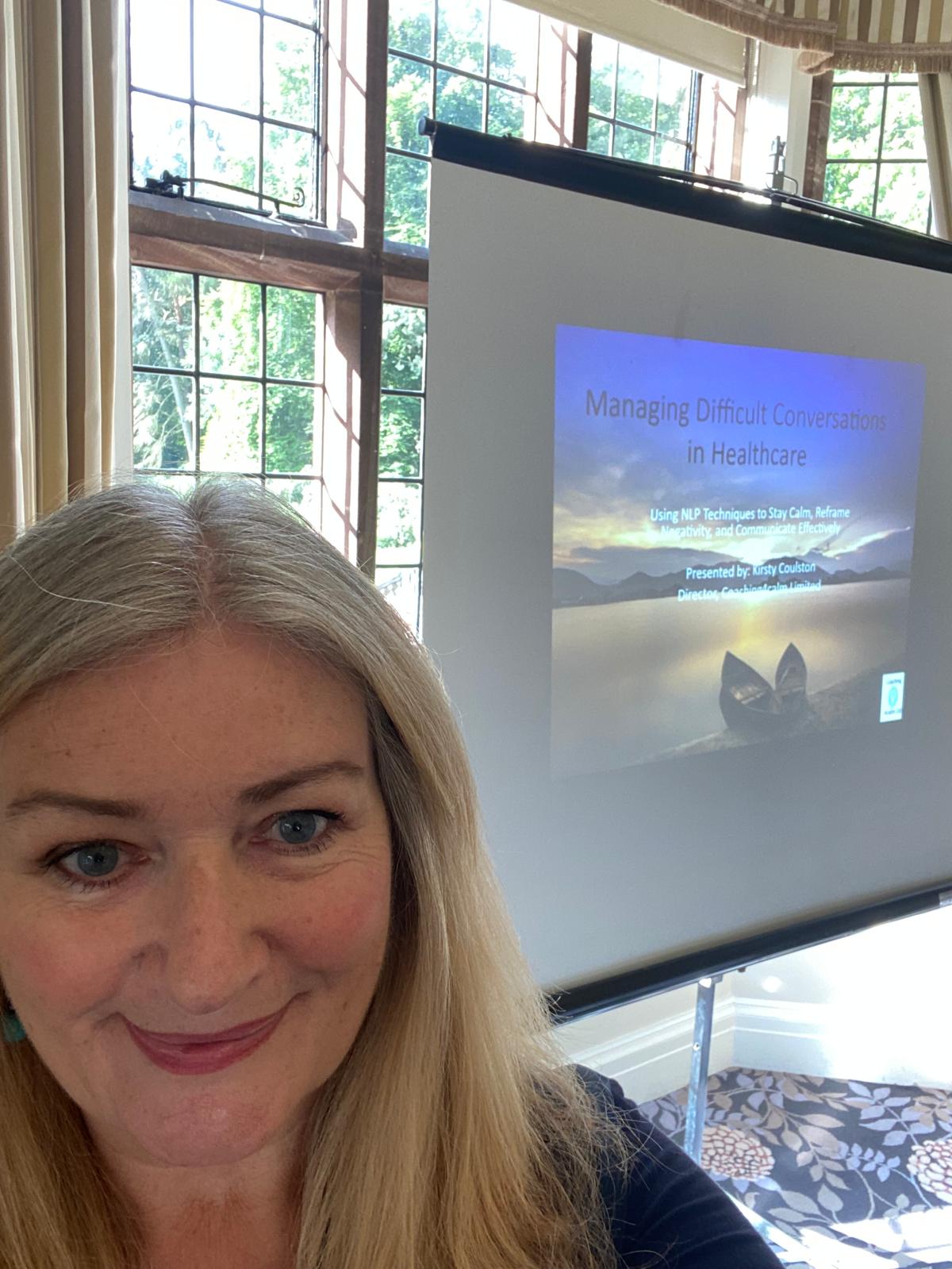 Professional headshot of NLP practitioner and coach